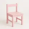 Silla infantil de madera color rosa para renta en Punta Cana