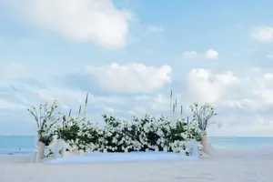 Stylish Proposal with Floral Decorations by the Ocean