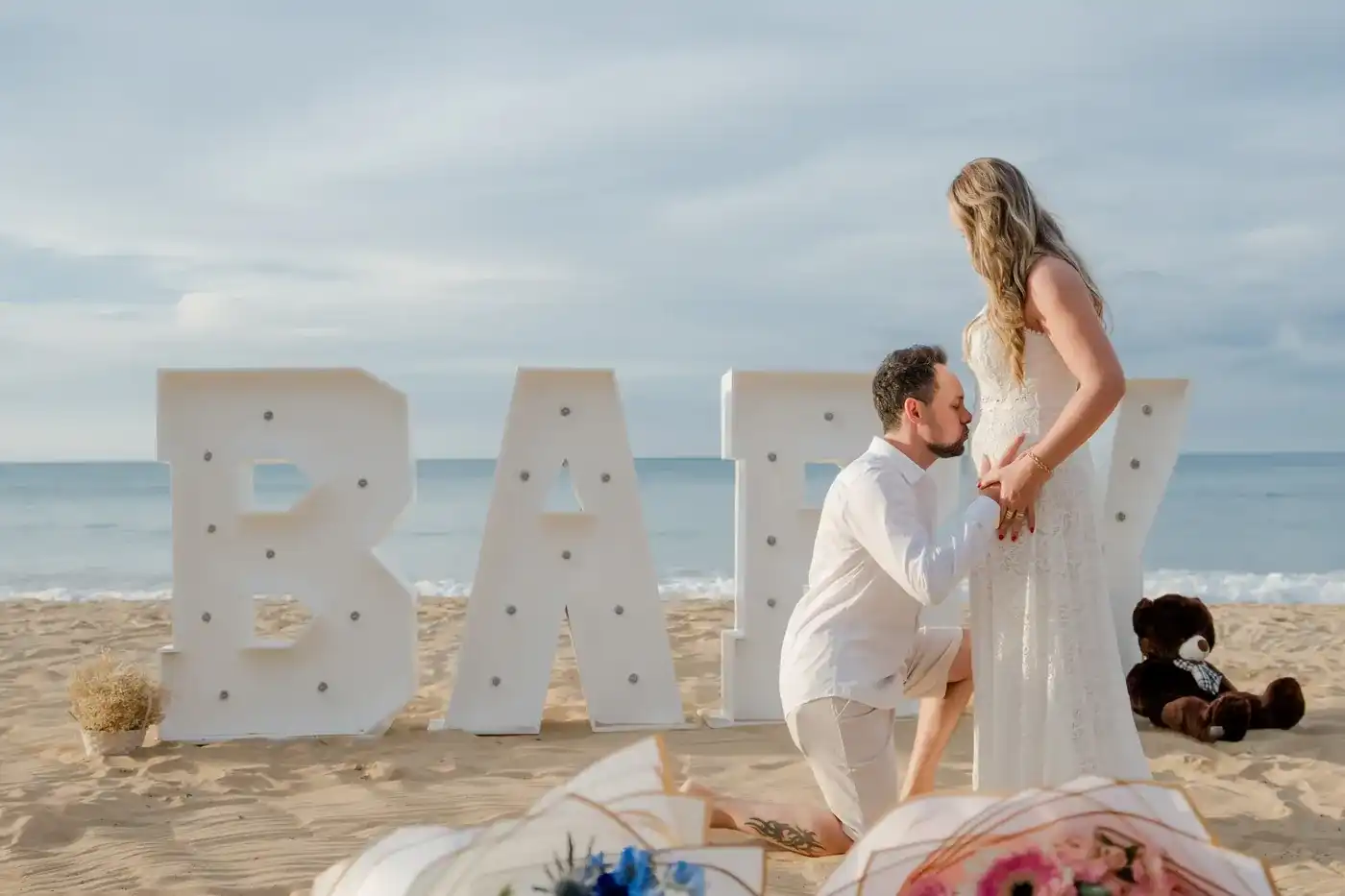 Expecting couple at their Punta Cana gender reveal