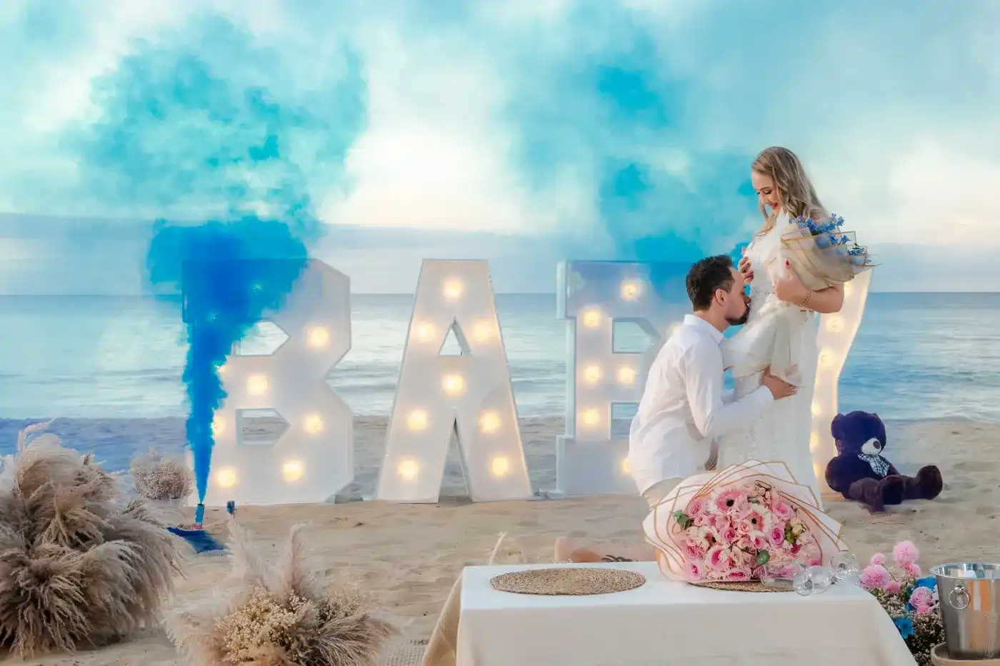 Blue smoke reveal moment on a Punta Cana beach